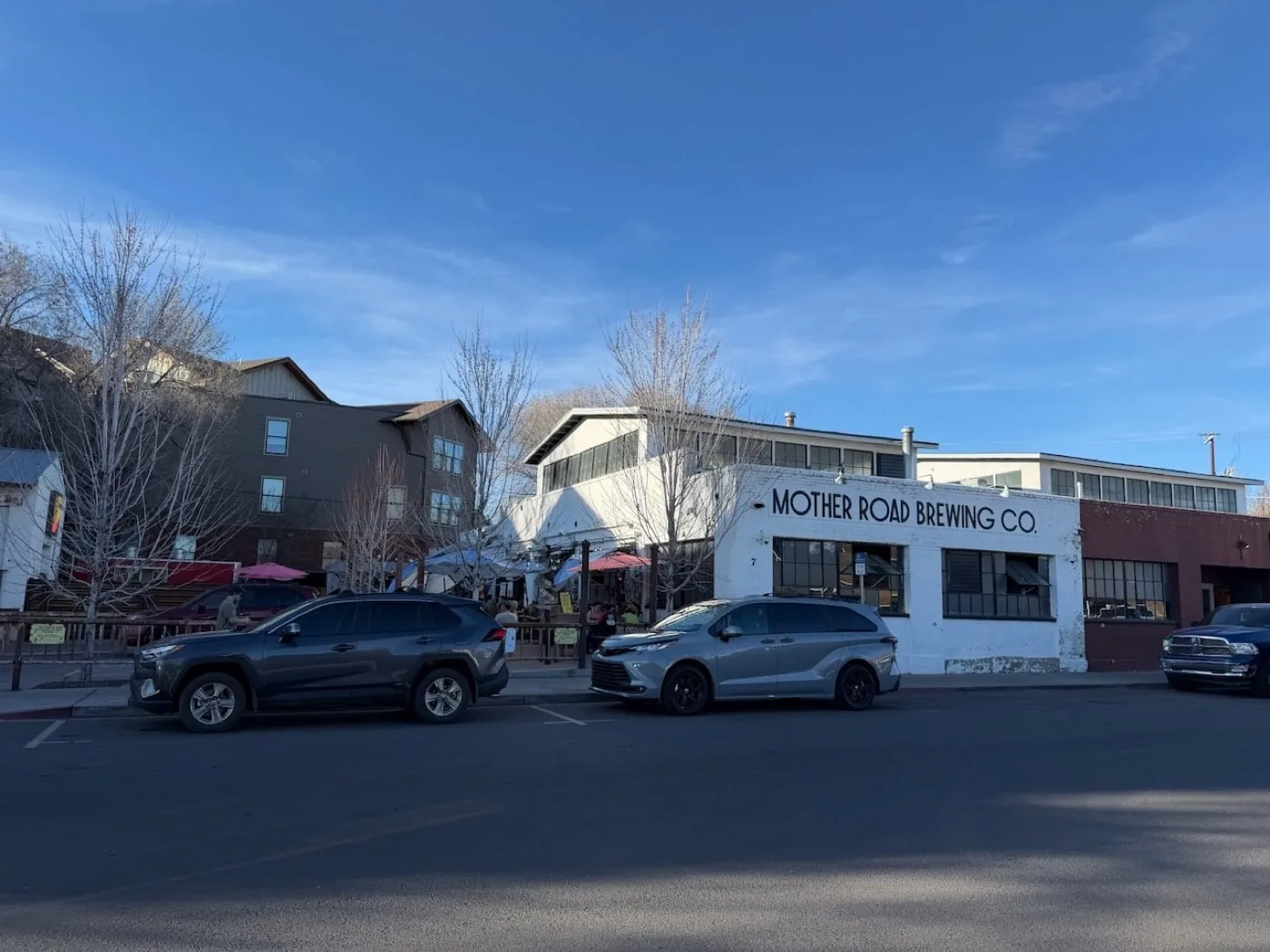 The white brick Mother Road Brewing Co. building and its patio on Mikes Pike in Southside Flagstaff